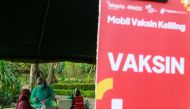 A healthcare worker prepares a dose of a vaccine against the coronavirus disease (COVID-19), as the Indonesia government speeds up its inoculation effort by deploying a mobile vaccine van, in Jakarta, Indonesia, July 8, 2021. Picture taken July 8, 2021. R