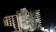 The partially collapsed Champlain Towers South residential building is demolished, in Surfside, Florida, July 4, 2021. REUTERS/Marco Bello/File Photo