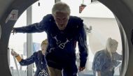 Richard Branson and Virgin Galactic crew members enter the company's passenger rocket plane, the VSS Unity, in a still image from undated handout video taken at Spaceport America near Truth or Consequences, New Mexico, U.S. Virgin Galactic/Handout via REU