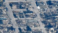 The charred remnants of homes and buildings, destroyed by a wildfire on June 30, are left behind in Lytton, British Columbia, Canada July 6, 2021, as seen in this aerial photograph. REUTERS/Jennifer Gauthier/File Photo
