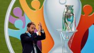 England manager Gareth Southgate applauds fans after the match next to the trophy Pool via REUTERS/John Sibley 