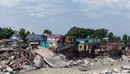 A view shows damaged houses along Manjhi River after flash floods in Chetru village in the Kangra district of the northern state of Himachal Pradesh, India, July 13, 2021. REUTERS/Stringer