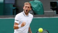 FILE PHOTO: Tennis - Wimbledon - All England Lawn Tennis and Croquet Club, London, Britain - July 2, 2021 Great Britain's Dan Evans reacts during his third round match against Sebastian Korda of the U.S. REUTERS/Peter Nicholls/File Photo

