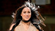 FILE PHOTO: Britain's Meghan Markle, Duchess of Sussex, arrives to meet academics and students during a roundtable discussion on female access to higher education with the Association of Commonwealth Universities, at the University of Johannesburg, Johann