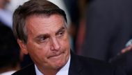 FILE PHOTO: Brazil's President Jair Bolsonaro looks on during a ceremony at the Planalto Palace in Brasilia, Brazil, June 29, 2021. REUTERS/Adriano Machado/File Photo
