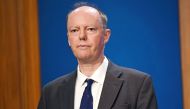 Britain's Chief Medical Officer for England Chris Whitty looks on at a news conference as he gives an update on relaxing restrictions imposed on the country during the coronavirus disease (COVID-19) pandemic inside the Downing Street Briefing Room in Lond