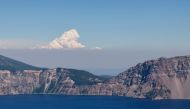 Plumes of smoke from the Bootleg Fire can be seen from 70 miles away at Crater Lake National Park, Oregon, U.S., July 16, 2021 as the fire. REUTERS/Mathieu Lewis-Rolland