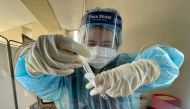 A nurse prepares a coronavirus disease (COVID-19) test in Bangkok, Thailand, July 17, 2021. REUTERS/Jorge Silva