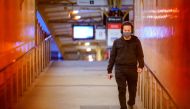 A lone passenger wearing a protective face mask walks from a deserted train platform at Flinders Street during morning commute hours on the first day of a lockdown as the state of Victoria looks to curb the spread of a coronavirus disease (COVID-19) outbr