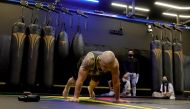 Cassiano Rodrigues Laureano breaks Guinness World Record of most number of burpees in 60 minutes, in Singapore July 20, 2021. REUTERS/Joseph Campbell