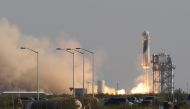 Billionaire businessman Jeff Bezos is launched with three crew members aboard a New Shepard rocket on the world's first unpiloted suborbital flight from Blue Origin's Launch Site 1 near Van Horn, Texas , US, July 20, 2021. (Reuters/Joe Skipper)