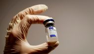 FILE PHOTO: A medical specialist holds a vial of Sputnik V vaccine against the coronavirus in a department store in Moscow, Russia, January 18, 2021 REUTERS/Shamil Zhumatov/File Photo
