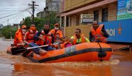 Members of National Disaster Response Force (NDRF) evacuate people from a flooded area to safer places in Kolhapur in the western state of Maharashtra, India, July 24, 2021. REUTERS/Abhijeet Gurjar