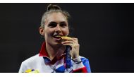 Tokyo 2020 Olympics - Fencing - Women's Individual Sabre - Medal Ceremony - Makuhari Messe Hall B, Chiba, Japan - July 26, 2021. Gold medallist Sofia Pozdniakova of the Russian Olympic Committee celebrates on the podium REUTERS/Maxim Shemetov
