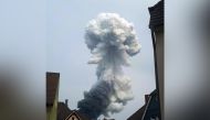 Smoke billows following an explosion in Wiesdorf, Leverkusen, Germany July 27, 2021, in this photo obtained from social media. Anna Fross/via Reuters 