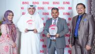 Ayman Al Qudwa and Shabeer Mohammed with the awards during the Annual Business Awards celebration  