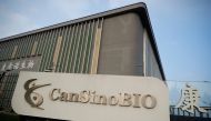 A logo of China's vaccine specialist CanSino Biologics Inc is pictured on the company's headquarters in Tianjin, following an outbreak of the coronavirus disease (COVID-19), China August 17, 2020. REUTERS/Thomas Peter/File Photo