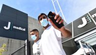 July 14, 2021 Juventus' Mattia Perin and Hamza Rafia arrives for training REUTERS/Massimo Pinca/File Photo