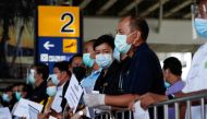 Hotel drivers wait for passengers at the airport, as Phuket reopens to overseas tourists, allowing foreigners fully vaccinated against the coronavirus disease (COVID-19) to visit the resort island without quarantine, in Phuket, Thailand July 1, 2021. REUT