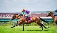 Jockey Kieran Shoemark guides Lady Bowthorpe towards the victory in the Qatar Nassau Stakes on the third day of the Qatar Goodwood Festival yesterday.