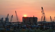 A view shows the grain silo that was damaged during last year's Beirut port blast, during sunset in Beirut, Lebanon, July 29, 2021. Picture taken July 29, 2021. REUTERS/Mohamed Azakir