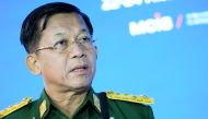 FILE PHOTO: Commander-in-Chief of Myanmar's armed forces, Senior General Min Aung Hlaing, delivers a speech at the IX Moscow conference on international security in Moscow, Russia, June 23, 2021. Alexander Zemlianichenko/Pool via REUTERS/File Photo