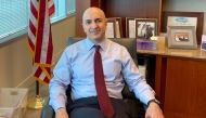 FILE PHOTO: Minneapolis Federal Reserve Bank President Neel Kashkari poses during an interview with Reuters in his office at the bank's headquarters in Minneapolis, Minnesota, U.S., January 10, 2020. REUTERS/ Ann Saphir/File Photo
