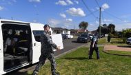 Australian Defence Force personnel and NSW police deliver emergency food parcels for people in lockdown in the Fairfield suburb in the southwest of Sydney, Australia, August 2, 2021. AAP Image/Mick Tsikas via REUTERS