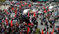 Demonstrators gather during a protest against what they call the government's failure in handling the coronavirus disease (COVID-19) outbreak, in Bangkok, Thailand, August 7, 2021. Reuters/Soe Zeya Tun