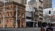Pedestrians wearing protective face masks walk through the city centre during a lockdown to curb the spread of a coronavirus disease (COVID-19) outbreak in Sydney, Australia, August 9, 2021. REUTERS/Loren Elliott