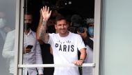 August 10, 2021 Lionel Messi waves as he arrives in Paris REUTERS/Yves Herman