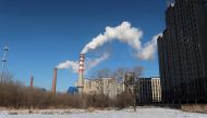 A coal-fired heating complex is seen behind the ground covered by snow in Harbin, Heilongjiang province, China November 15, 2019. Picture taken November 15, 2019. REUTERS/Muyu Xu//File Photo