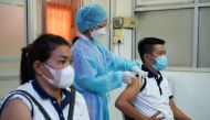 People receive an AstraZeneca coronavirus disease (COVID-19) vaccine as a booster dose at the National Pediatric Hospital in Phnom Penh, Cambodia, August 12, 2021.REUTERS/Cindy Liu