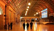 Police officers patrol through the quiet Central Station in the city centre during a lockdown to curb the spread of a coronavirus disease (COVID-19) outbreak in Sydney, Australia, August 12, 2021. REUTERS/Loren Elliott