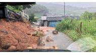 A landslide in Kure, Hiroshima Prefecture, Japan after heavy rains, in this August 13, 2021 photo obtained from social media. TWITTER @KAPPACHAN1115 /via REUTERS 