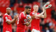 Manchester United's Bruno Fernandes celebrates his hat-trick. REUTERS/Phil Noble