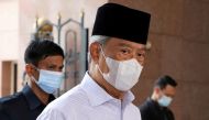 File photo: Malaysia's Prime Minister Muhyiddin Yassin wearing a protective mask arrives at a mosque for prayers, amid the coronavirus disease (COVID-19) outbreak in Putrajaya, Malaysia August 28, 2020. Reuters/Lim Huey Teng/File Photo