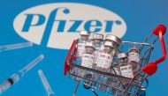 FILE PHOTO: A small shopping basket filled with vials labeled 