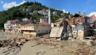 A view shows partially collapsed buildings, as the area was hit by flash floods that swept through towns in the Turkish Black Sea region, in the town of Ilisi, in Kastamonu province, Turkey, August 15, 2021. REUTERS/Mehmet Emin Caliskan