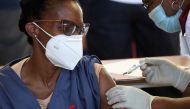 A healthcare worker receives the Johnson and Johnson coronavirus disease (COVID-19) vaccination at the Chris Hani Baragwanath Academic Hospital in Soweto, South Africa, Feb. 17, 2021. REUTERS/Siphiwe Sibeko/File Photo
