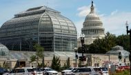 U.S. Capitol Police vehicles and other emergency vehicles respond as police investigated reports of a suspicious vehicle near the U.S. Capitol in Washington, U.S., August 19, 2021. REUTERS/Elizabeth Frantz

