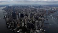Clouds form over Manhattan ahead of Hurricane Henri arriving in New York City, U.S., August 21, 2021. REUTERS/Andrew Kelly
