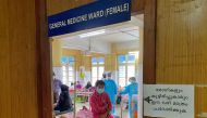 A man looks out from a coronavirus disease (COVID-19) ward in the Government Medical College Hospital in Manjeri, in the Malappuram district of the southern state of Kerala, India. August 18, 2021. Picture taken August 18, 2021. REUTERS/Krishna N. Das
