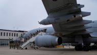 Members of the British armed forces 16 Air Assault Brigade disembark a RAF Voyager aircraft after landing at Brize Norton, Britain August 28, 2021. Alastair Grant/ Pool via REUTERS