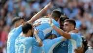Manchester City's Rodri celebrates scoring their fourth goal with teammates REUTERS/Russell Cheyne 