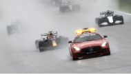 General view of the safety car and drivers as the start of the race is delayed due to bad weather REUTERS/Christian Hartmann