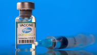 A vial labelled with the Pfizer-BioNTech coronavirus disease (COVID-19) vaccine is seen in this illustration picture taken March 19, 2021. REUTERS/Dado Ruvic/Illustration/File Photo/File Photo