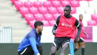 Qatar's Almoez Ali (right) with a team-mate during a pre-match training session at the Nagyerdei Stadion in Debrecen, yesterday.