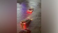 Vehicles are stranded on a flooded road in Yonkers in New York, U.S. September 1, 2021, in this still image taken from video obtained from social media. TRI-STATE WEATHER/via REUTERS 