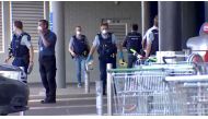 A screen grab shows police officers working outside a shopping mall following a knife attack in Auckland, New Zealand September 3, 2021. TVNZ via Reuters TV 